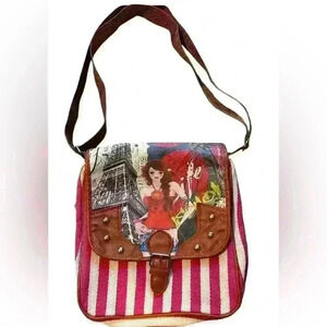 A red and white striped Paris themed messenger crossbody bag